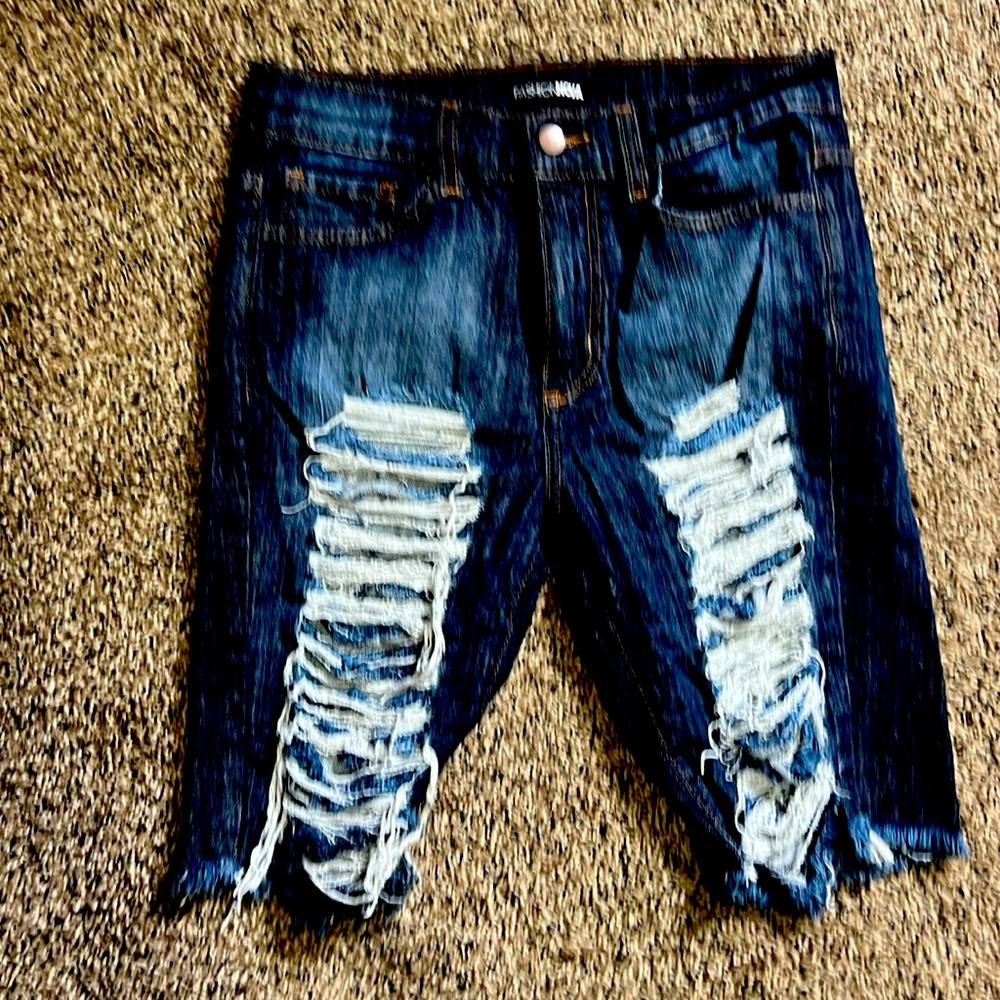 Fashion nova, long shorts. Distressed, dark denim.size 7